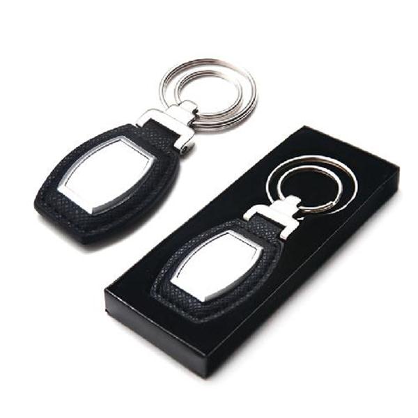 Chaveiro de couro com metal e 2 argolas